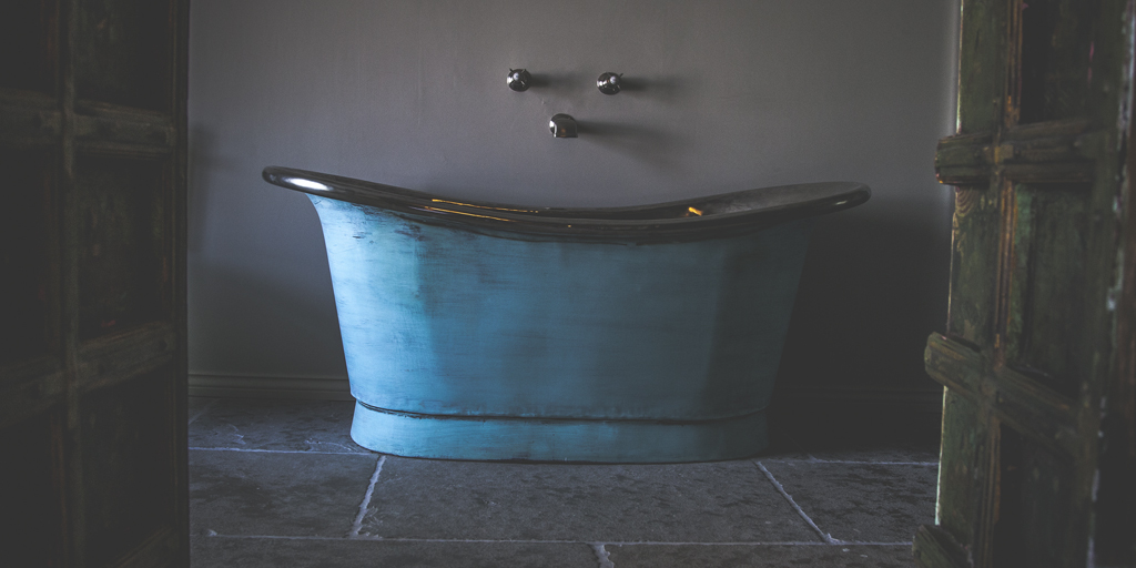 A stunning Verdigris Bateau Bath with Nickel Interior at the Le Petit Chateau